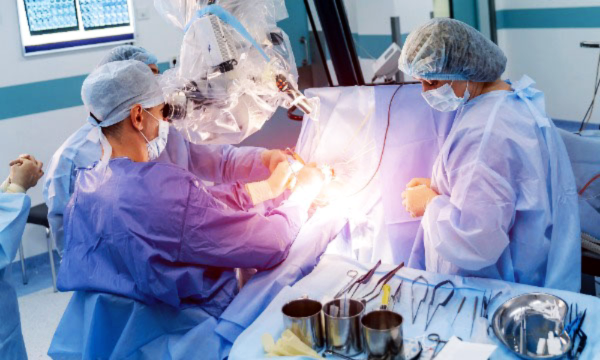 surgeons performing a complex medical procedure