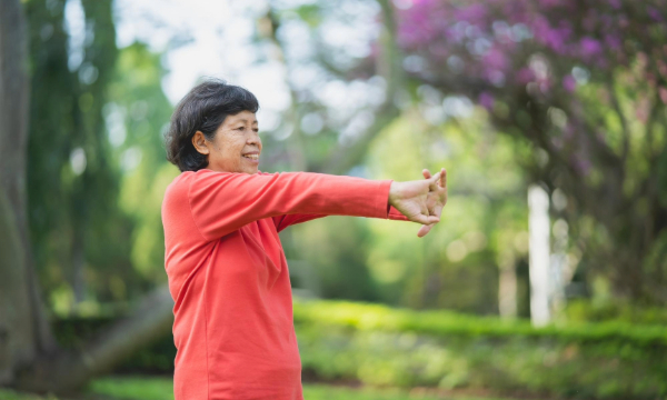 old woman stretching